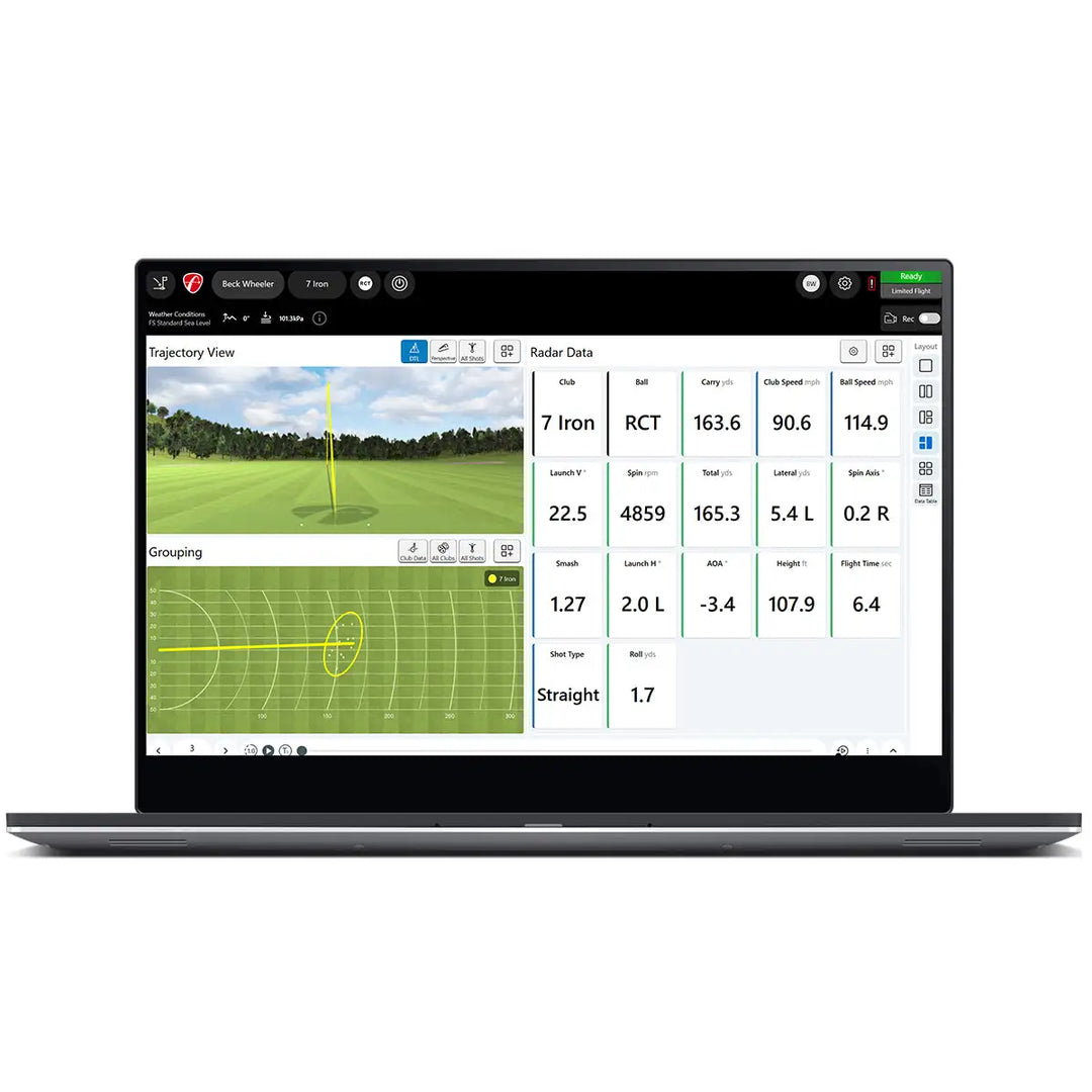 A laptop displaying golf swing analysis software with trajectory and grouping views, radar data, and shot metrics on the screen.